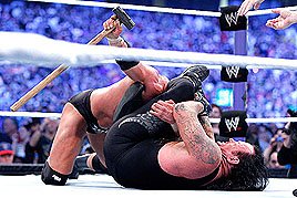 After a grueling bout, The Undertaker put away Triple H.